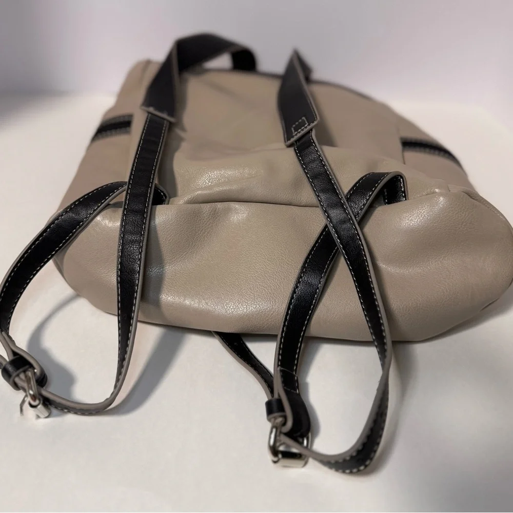 Stylish Tan and Black  Backpack purse in like new condition